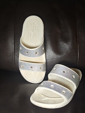 CROCS Women's Ivory Slides with Silver Glitter Straps